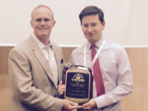 Dr. Palma being presented with his award from Don Crouse, Vice President of the MSA Coalition